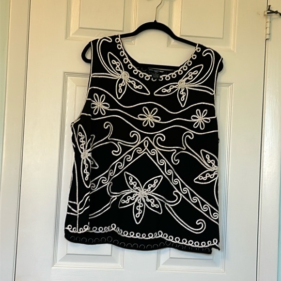 Sleeveless black top with white/silver sash trim on both front and back - Picture 1 of 2